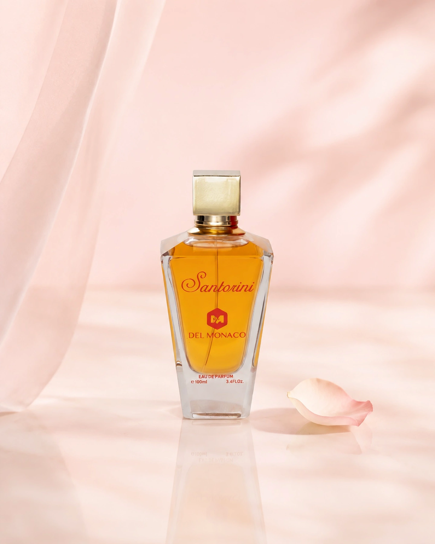 Real Santorini Del Monaco perfume bottle with soft pink luxury styling